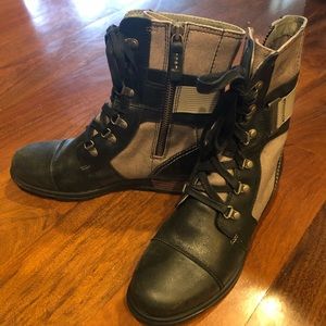 Sorel Black and Tan flat boots. Side zip